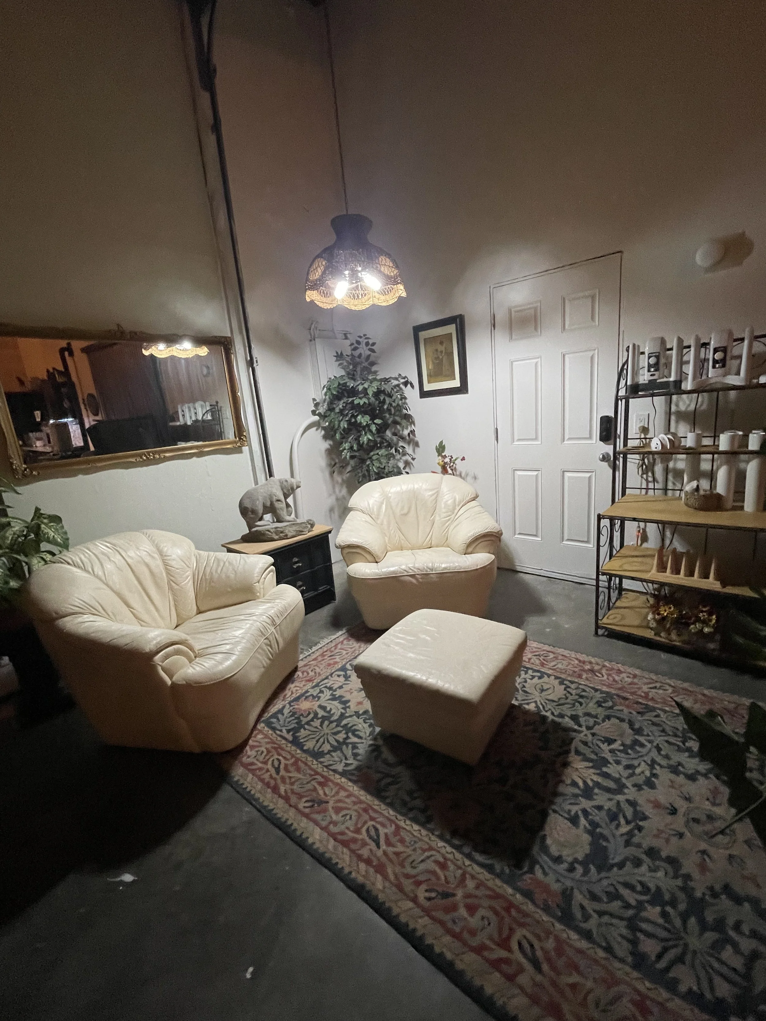 A cozy reading nook welcomes you on the left as you enter.