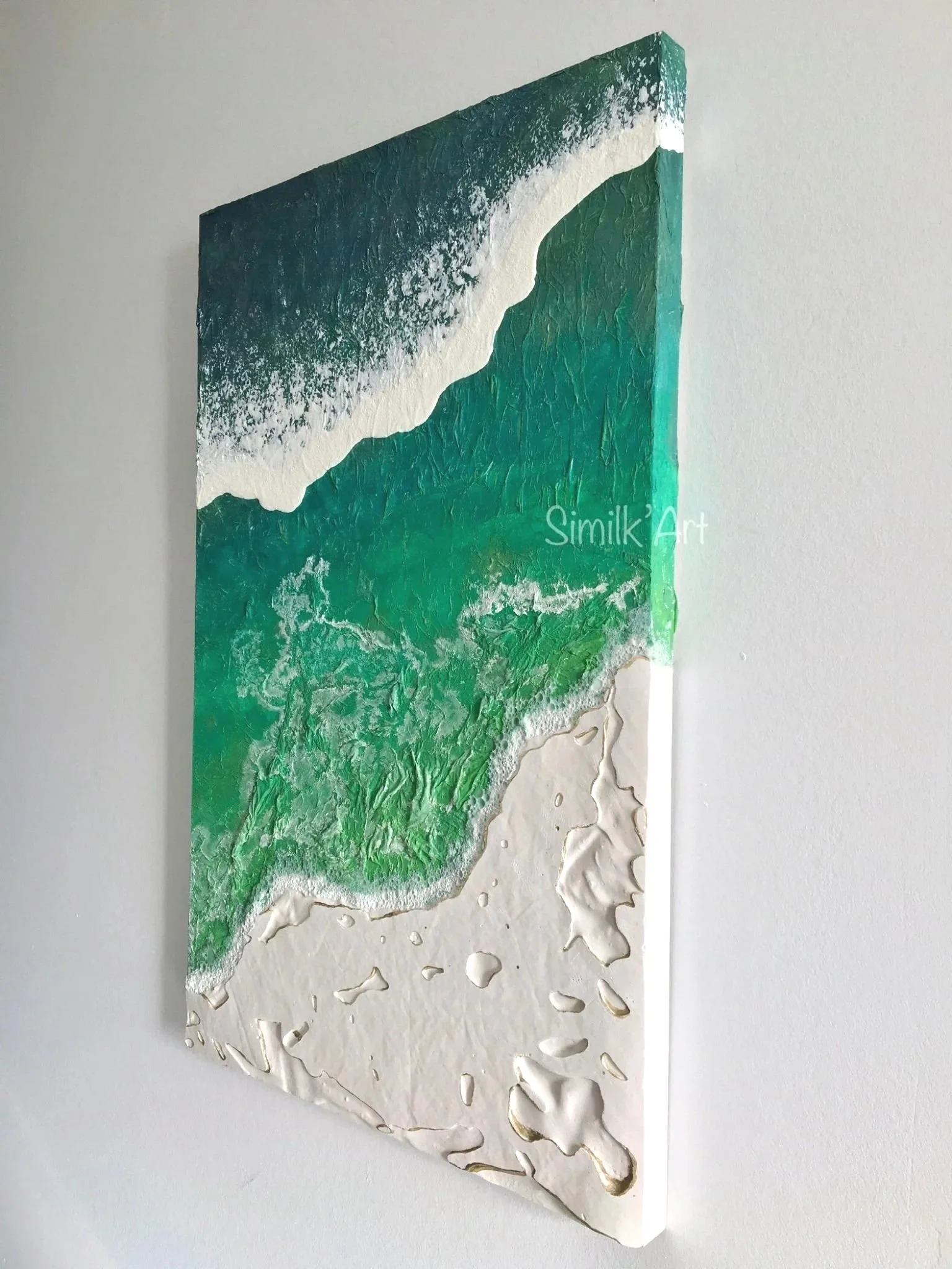 the beach represented in this Wall Art stands out with layered textures simulating the white volcanic rocks that were formed in Sarakiniko Beach