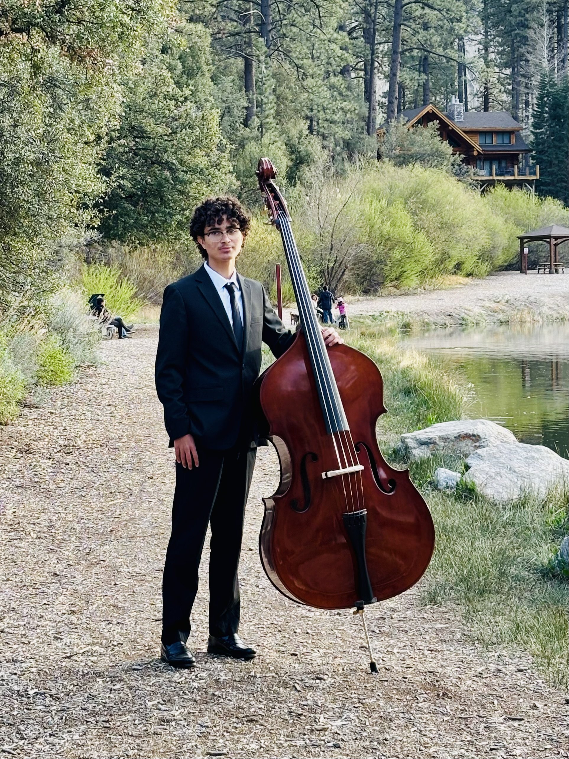 Cavell Diaz standing with upright bass