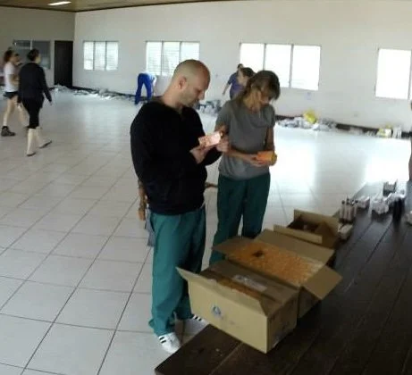 Healthier Futures International volunteers organize medical supplies and medications for 2015 mission trip