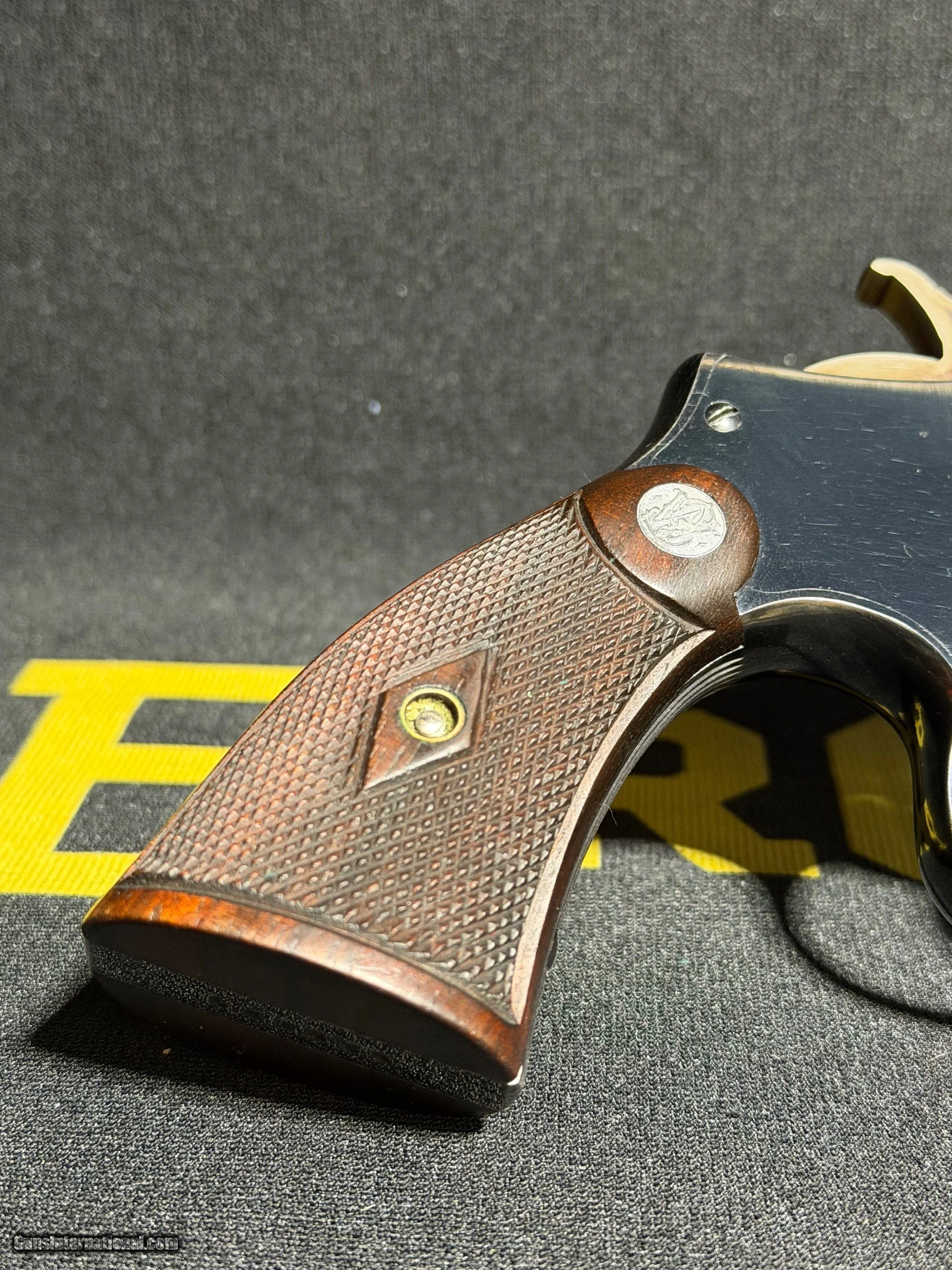 Smith-and-Wesson-K22-Outdoorsman-22-LR_103518829_107868_7A7D529E7CA99FC1.jpeg