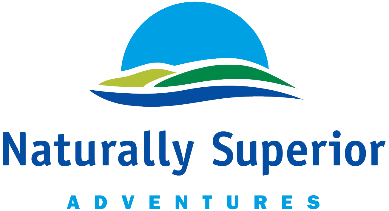 Logo for Naturally Superior Adventures featuring a stylized landscape with hills, water, and a blue sun or moon above, and text in blue reading "Naturally Superior Adventures".