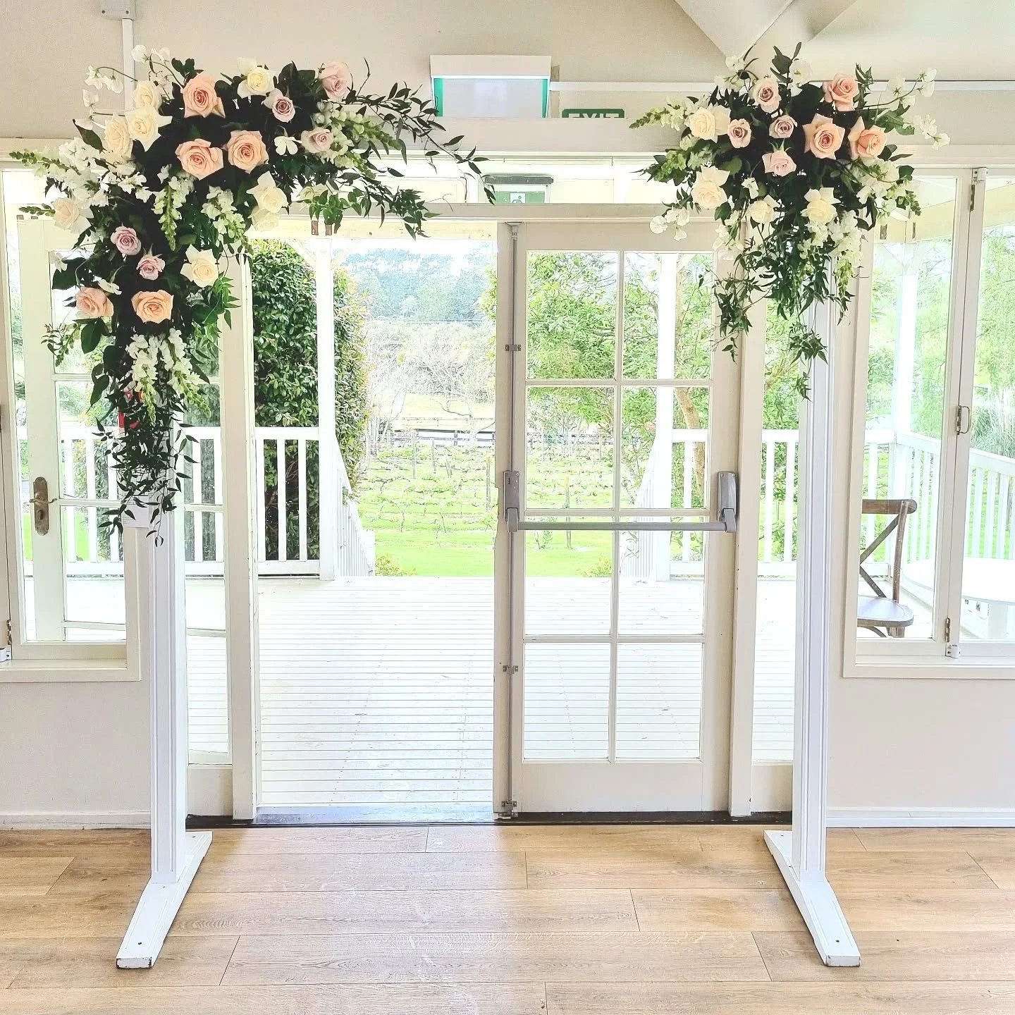 Our white wash wooden wedding arch was handmade in NZ and designed specifically for our clients to  assemble easily. It's a timeless and beautiful look when dressed with flowers 🥰