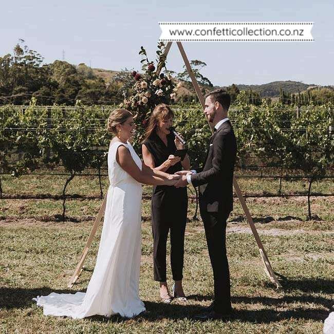 triangle-brown-wooden-arch-wedding-ceremony-event-hire-whangarei-boho