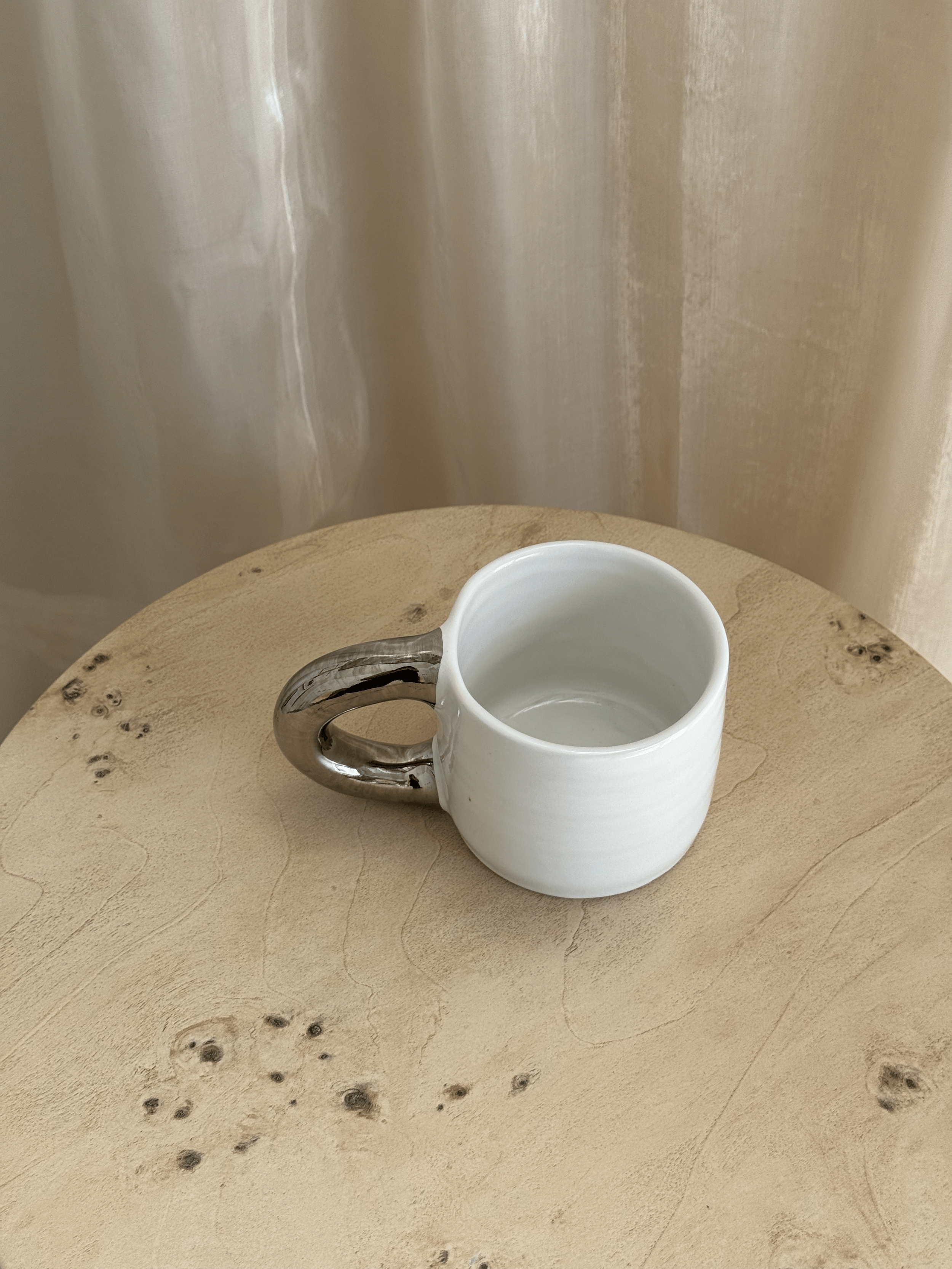 white: chrome handle mug
