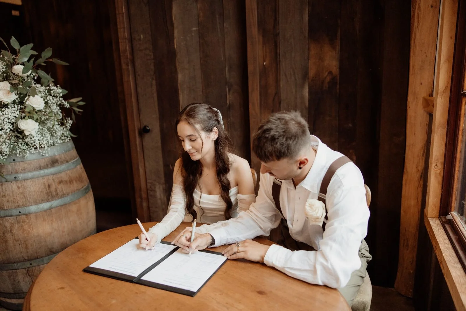 signing wedding certificate in barn wedding ceremony Melbourne