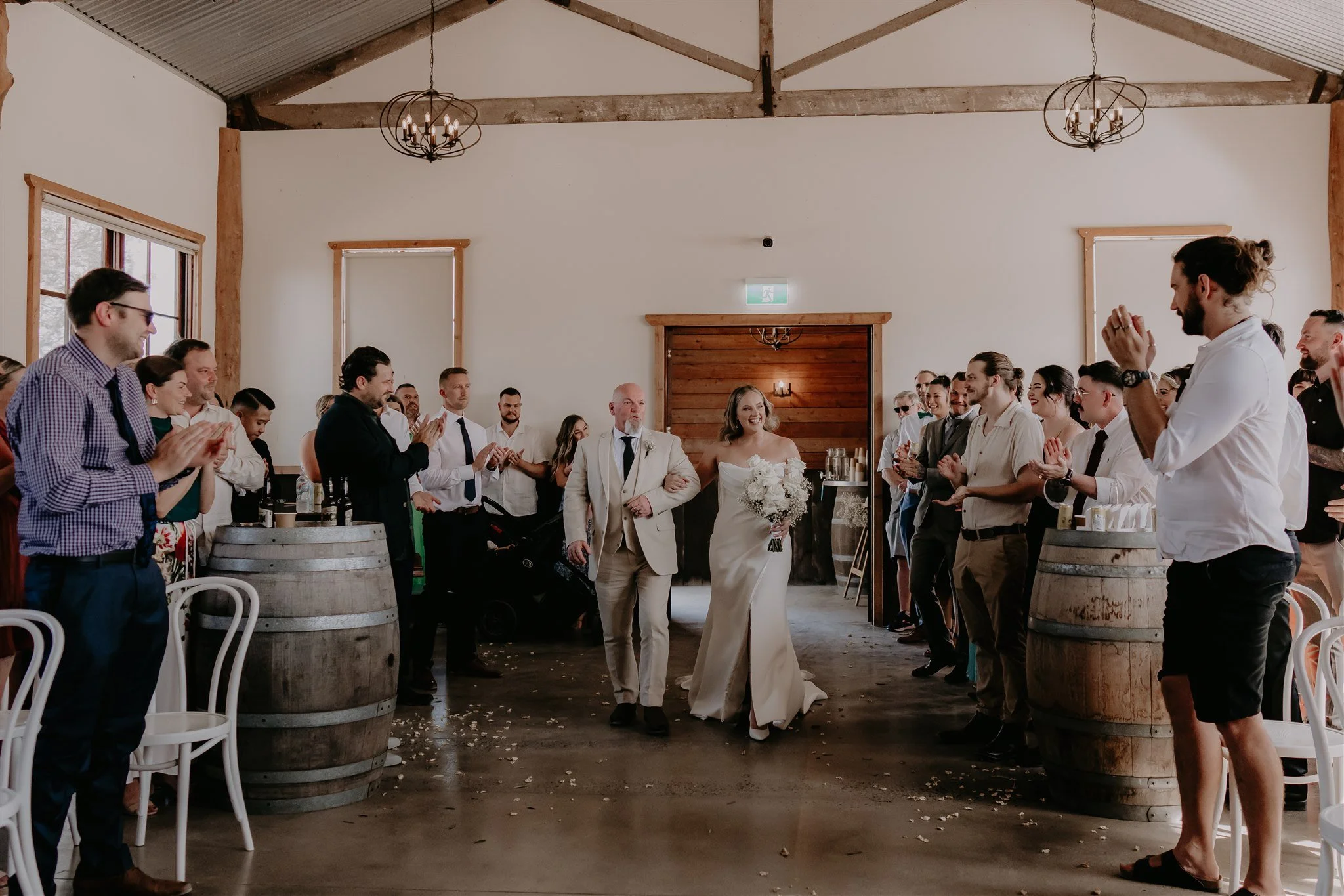 Father walking his daughter down the aisle in The Barn at The Shearing Shed Phillip Island, two hours out of Melbourne