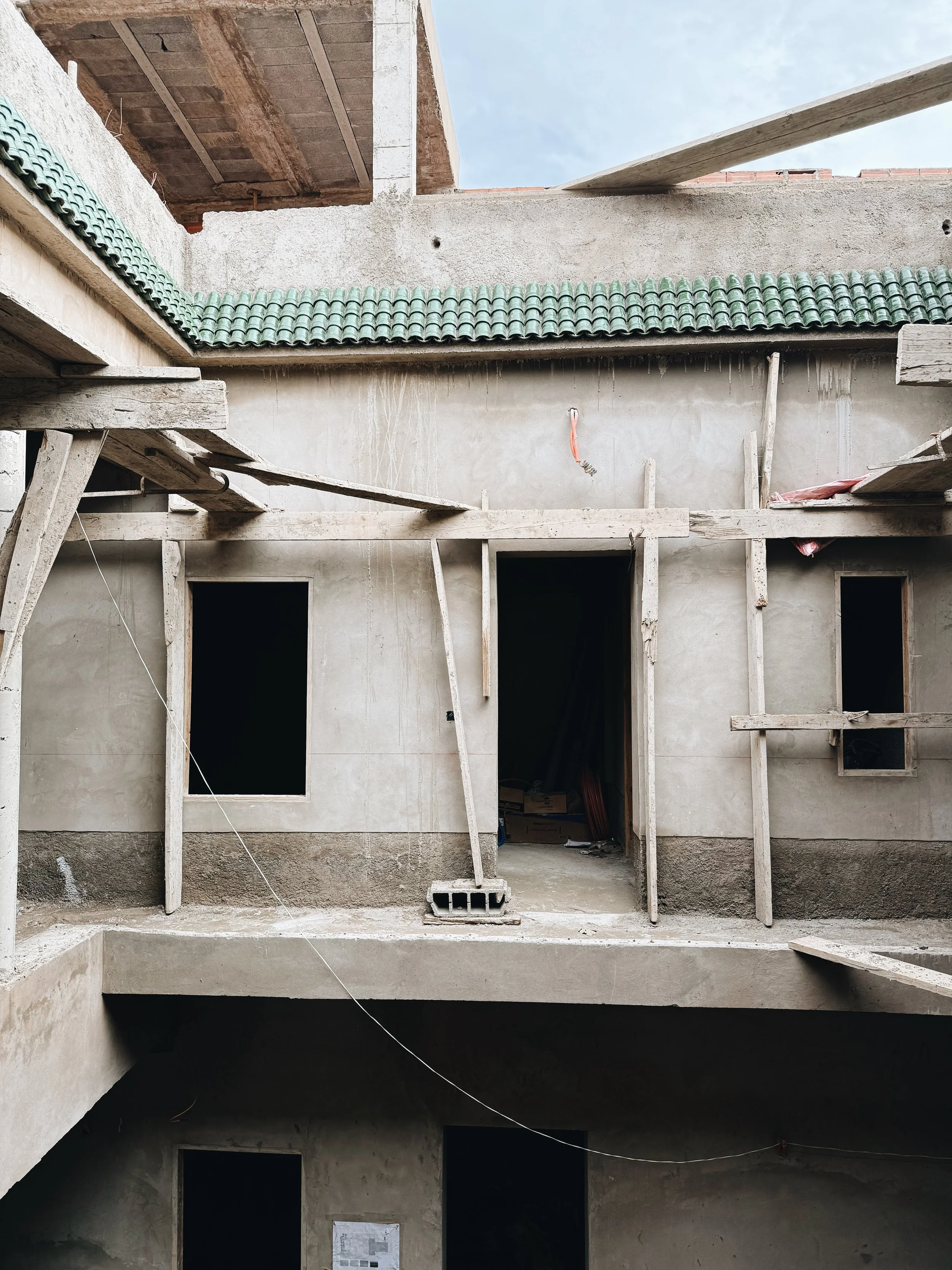 12/2025: The small green tiled roof has been completed