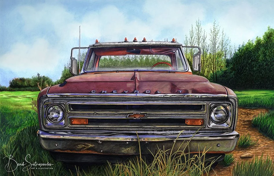 A vintage red Chevrolet truck on a dirt road surrounded by green grass and trees under a partly cloudy sky.