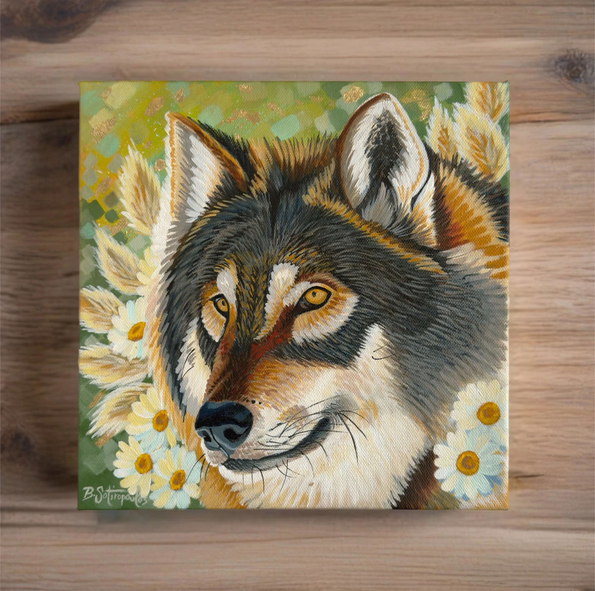 Framed portrait of a smiling Shiba Inu dog with a named tag 'Fuji' on its collar, placed on a white surface next to potted succulent plants.