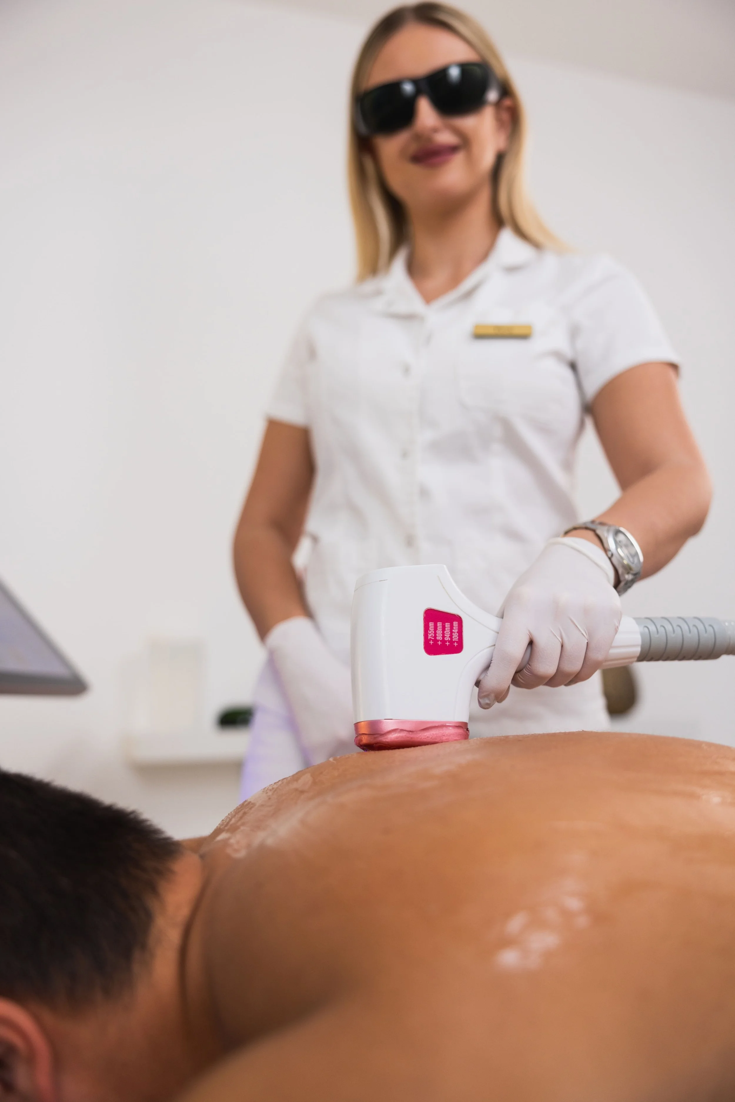 beautician-doing-mans-back-laser-epilation.jpg