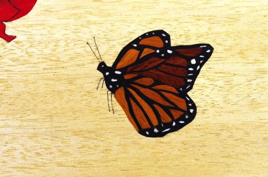 Red_Orchid_Butterfly_Close.jpg