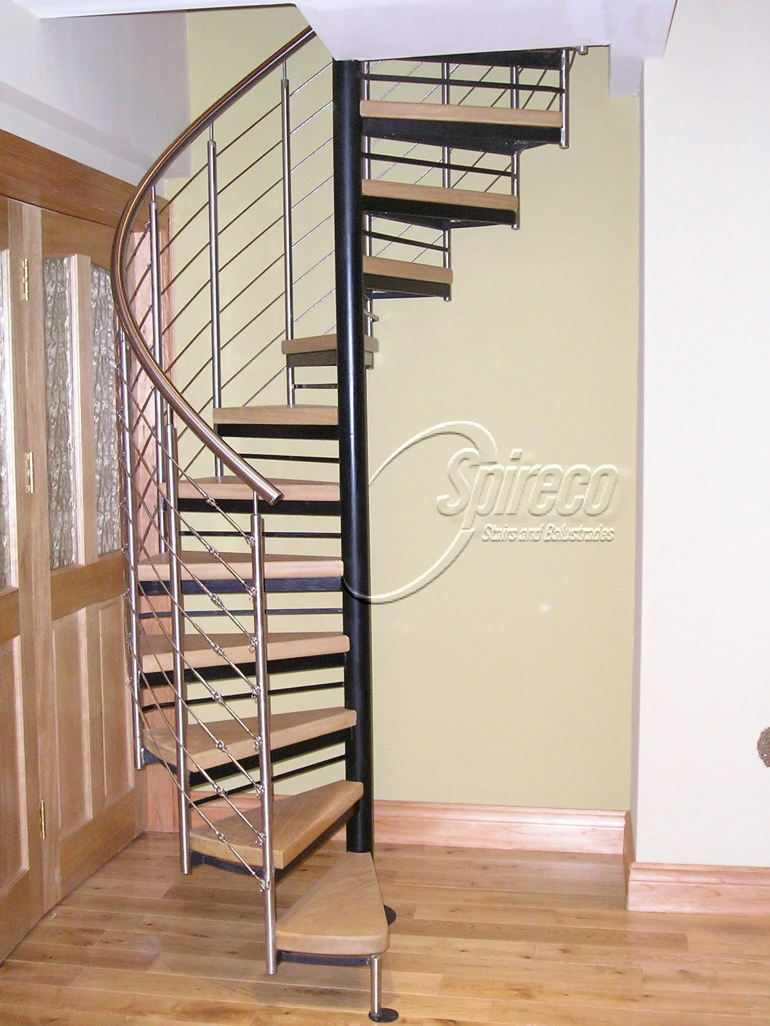 Stainless Wire Rope Spiral Stairs.
Stainless Steel Wire Rope Balustrade with 2″ thick Oak Treads.