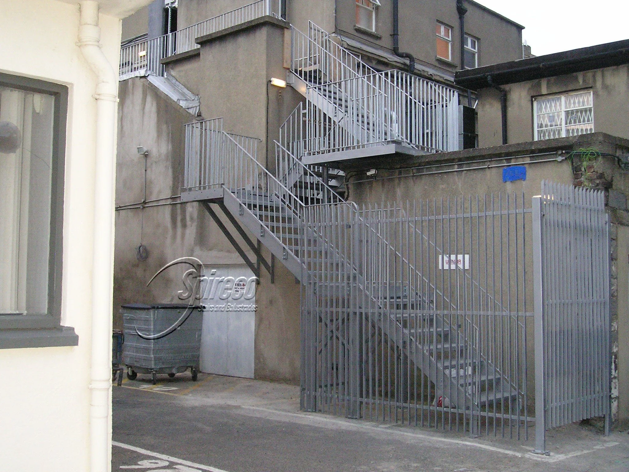 ‘Fitzwilliam Fire Escape’.
Galvanised Fire Escape Stairs & Landings with Chequer Plate Treads and Entrance Enclosure.