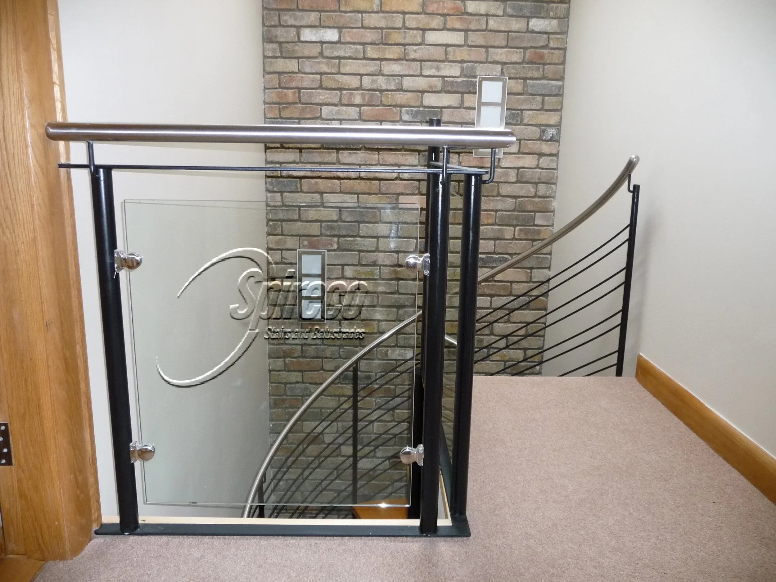 ‘Claremont’ Black Steel & Glass Balustrade.
Black Steel Posts with Stainless Steel Handrail and Glass Balustrade connected with Stainless Steel ‘Shell’ Clamps.