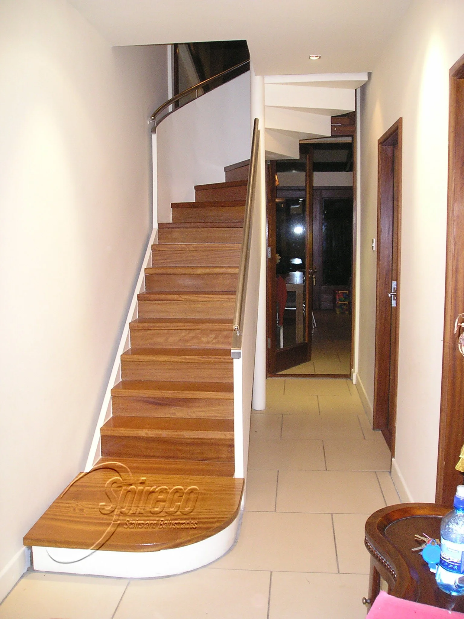‘Oulton’ Plastered Stair & Balustrade.
Plaster Clad Steel framed Semi-Spiral Stair with Iroko Treads & Platform and Stainless Steel Tubular Handrail.