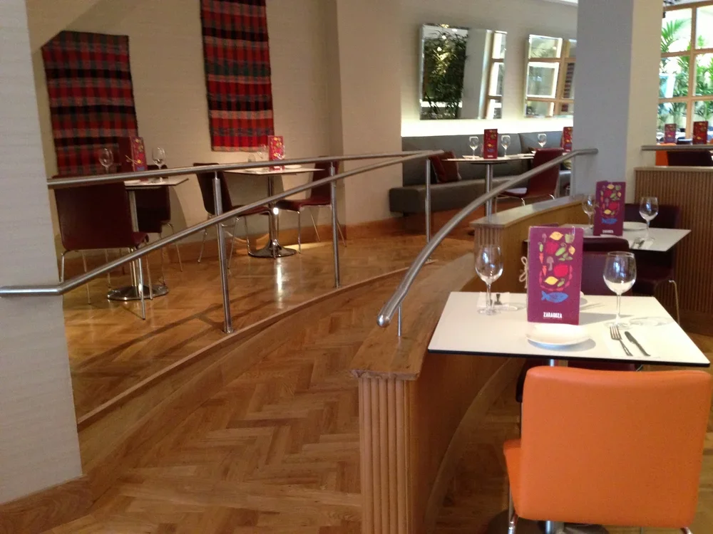 Handrails - Zaragoza Restaurant Curved Tubular Stainless Steel Handrails to Ramp.