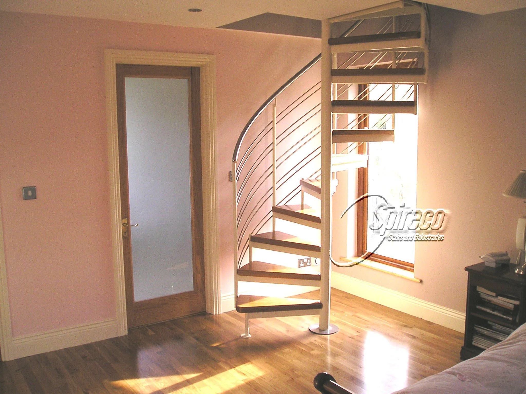 ‘Slip stream’ Spiral Stairs.
‘Slipstream’ model Spiral Stairs with Stainless Steel Handrail and Rod Balustrade and 2″ thick Oak treads.
