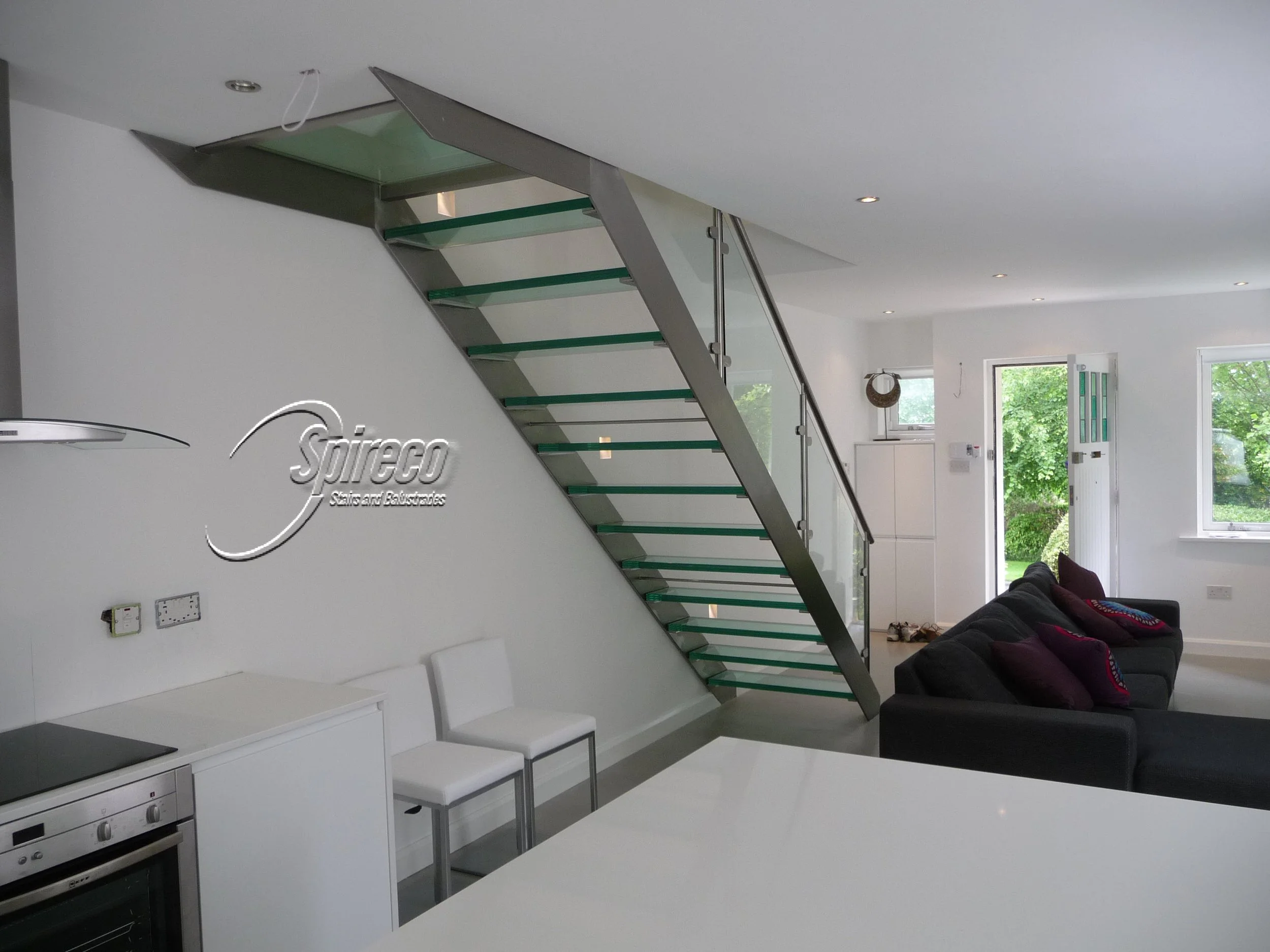 Glass Treaded Stainless Steel Stair.
Stainless Steel String Stair with Glass Treads & Landing and Stainless Steel & Glass Balustrade.