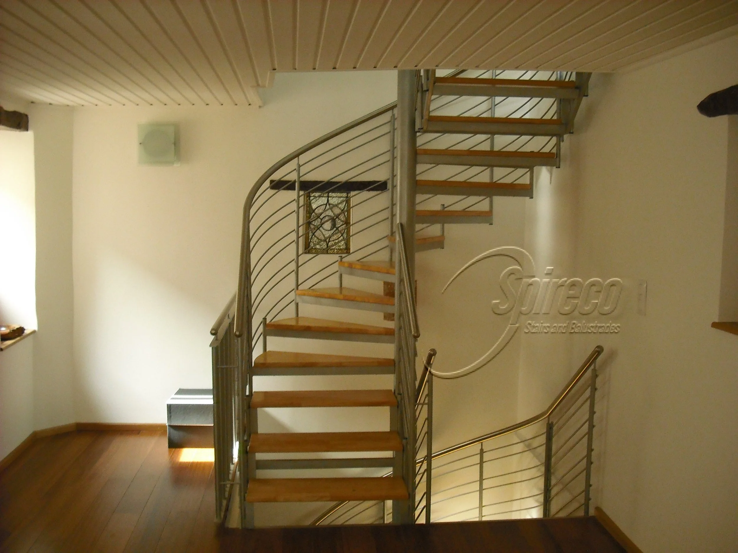 3 Stairs, one upon another, each Turning 180 Degrees with ‘Helix’ style Balustrade and Tubular Stainless Steel Handrail – installed by Spireco in the Medieval town of Valbonne, Southern France.