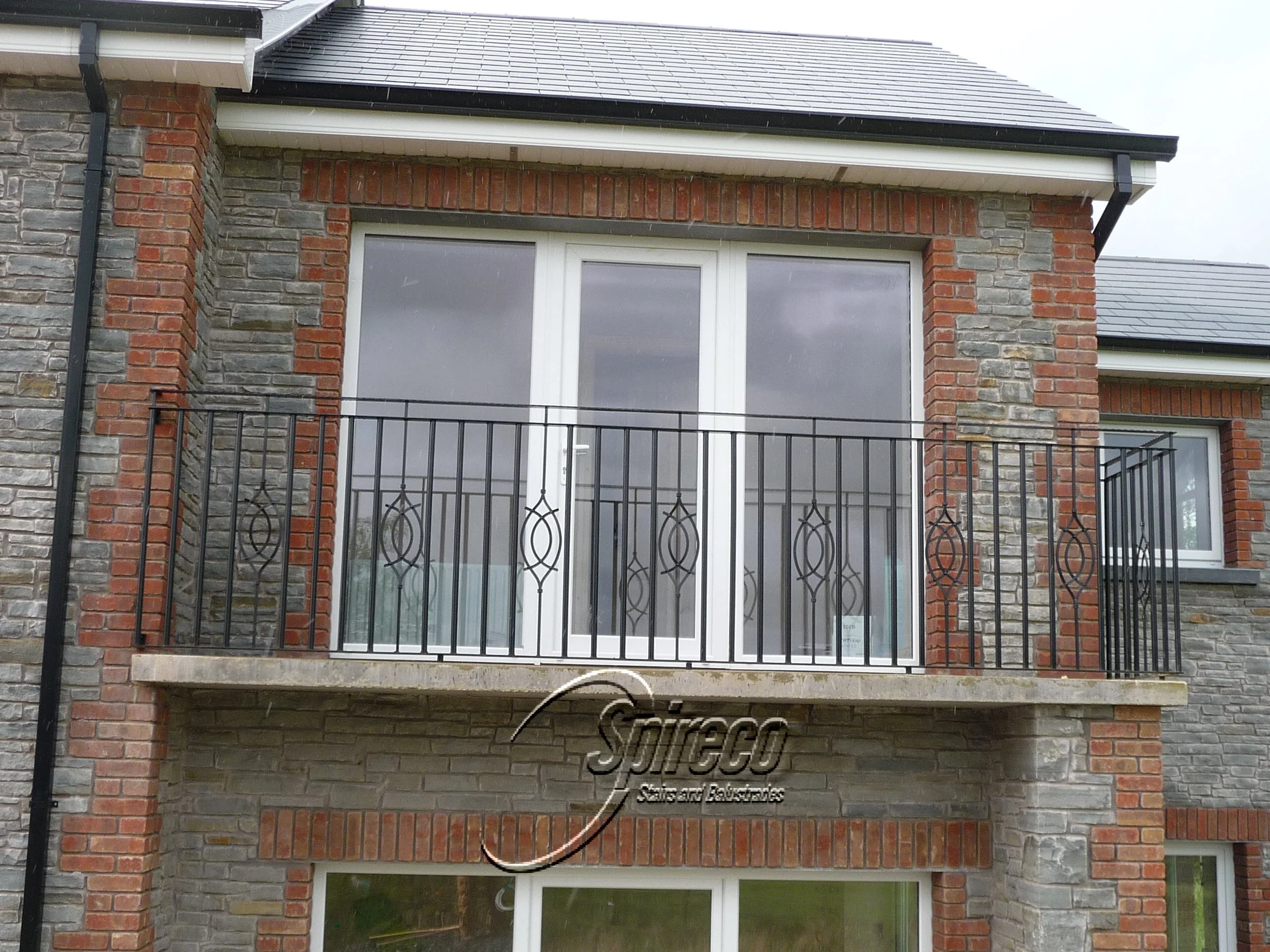 ‘Virginia’ Wrought Iron Balcony Balustrade.
Galvanised & Powder-coated Wrought Iron Balustrade to Balcony.