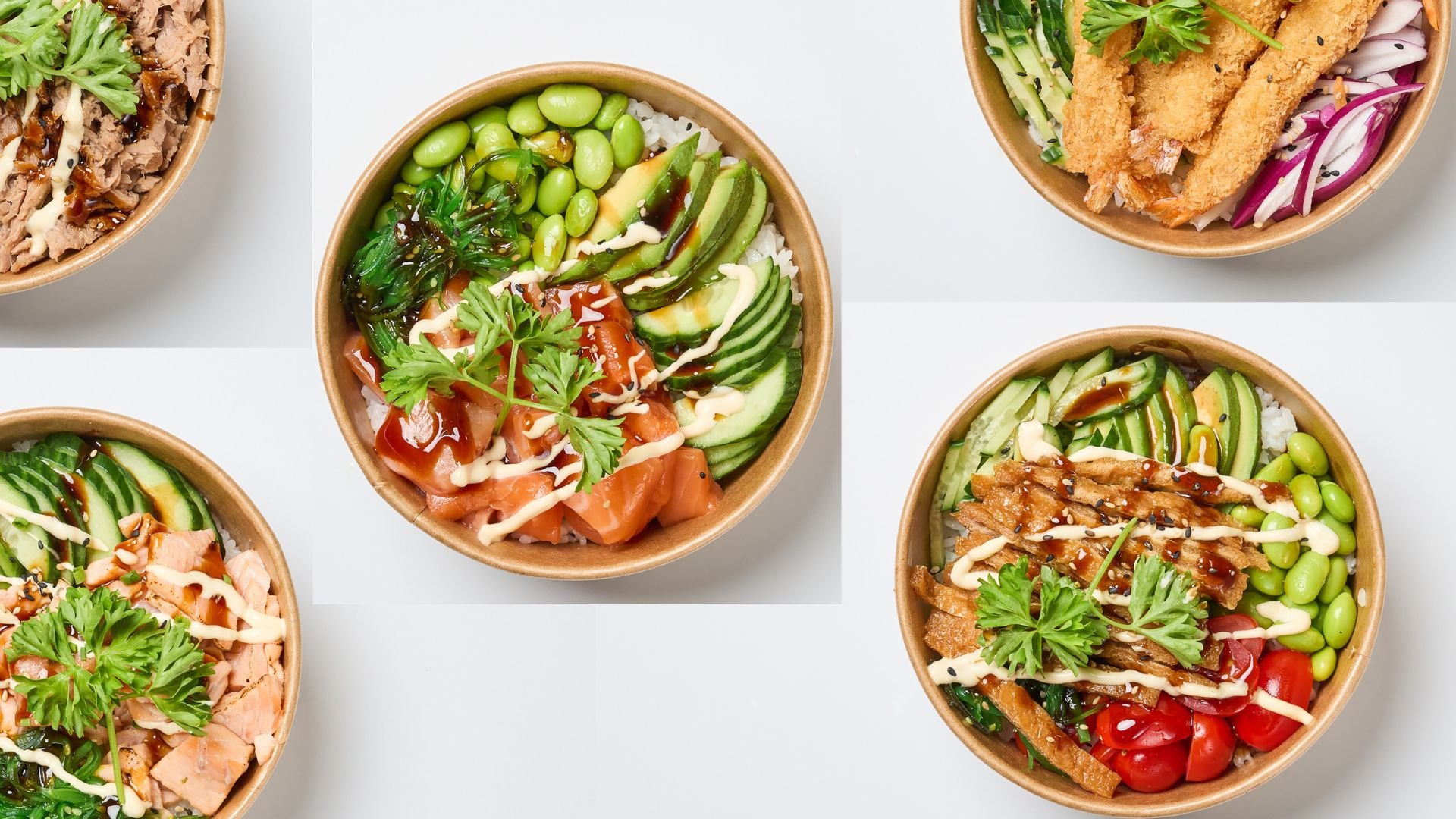 Four bowls of poke with various toppings including salmon, tuna, chicken, cucumbers, avocado, edamame, cherry tomatoes, and herbs.