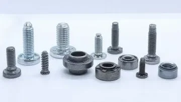 Various screws, bolts, and washers arranged on a white background.