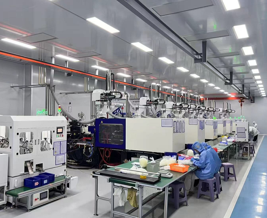 Modern cleanroom with advanced semiconductor manufacturing equipment, technicians in protective gear working at workstations.
