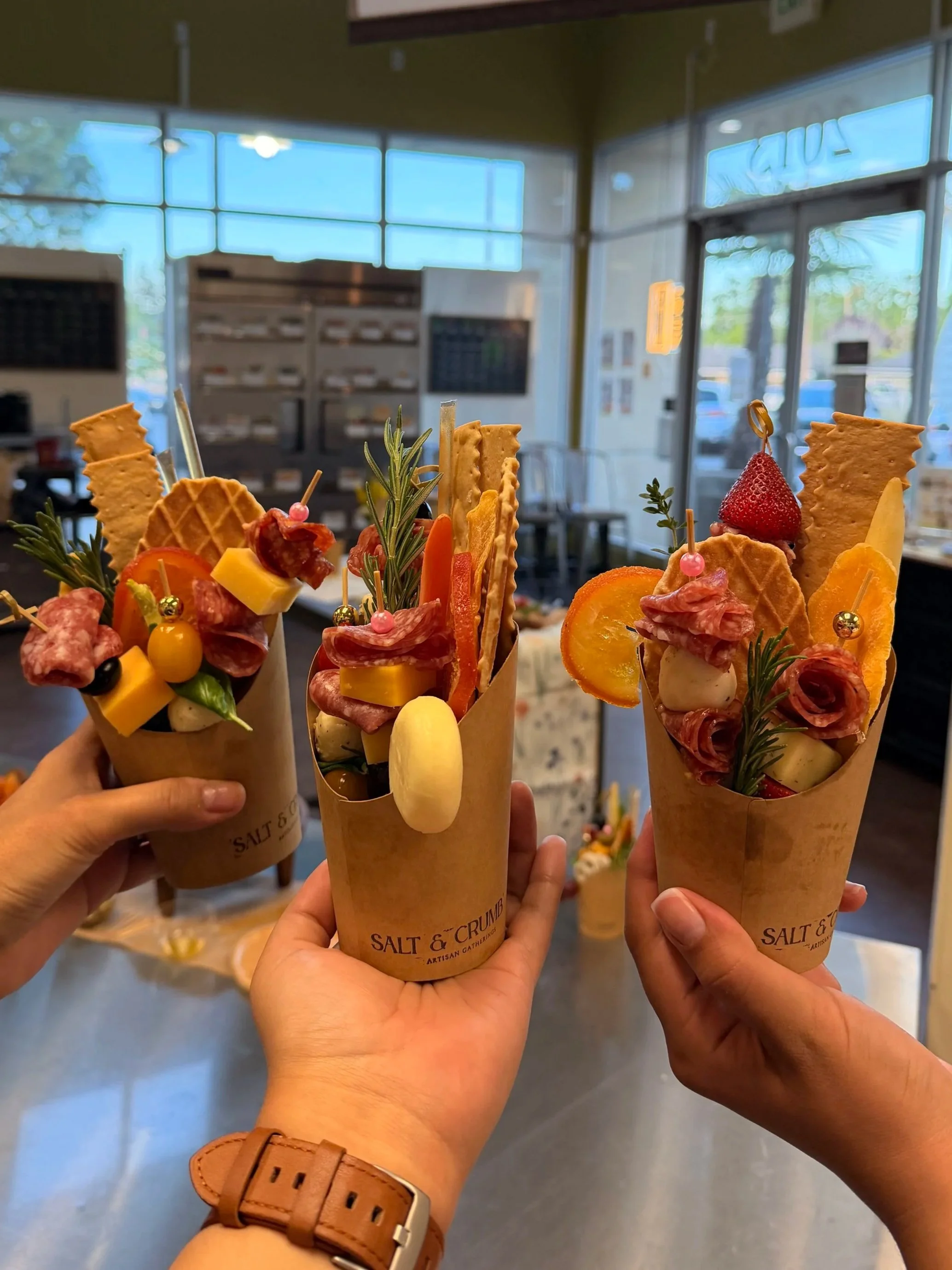 Guests enjoying Salt & Crumb charcuterie cups at a corporate event in Silicon Valley