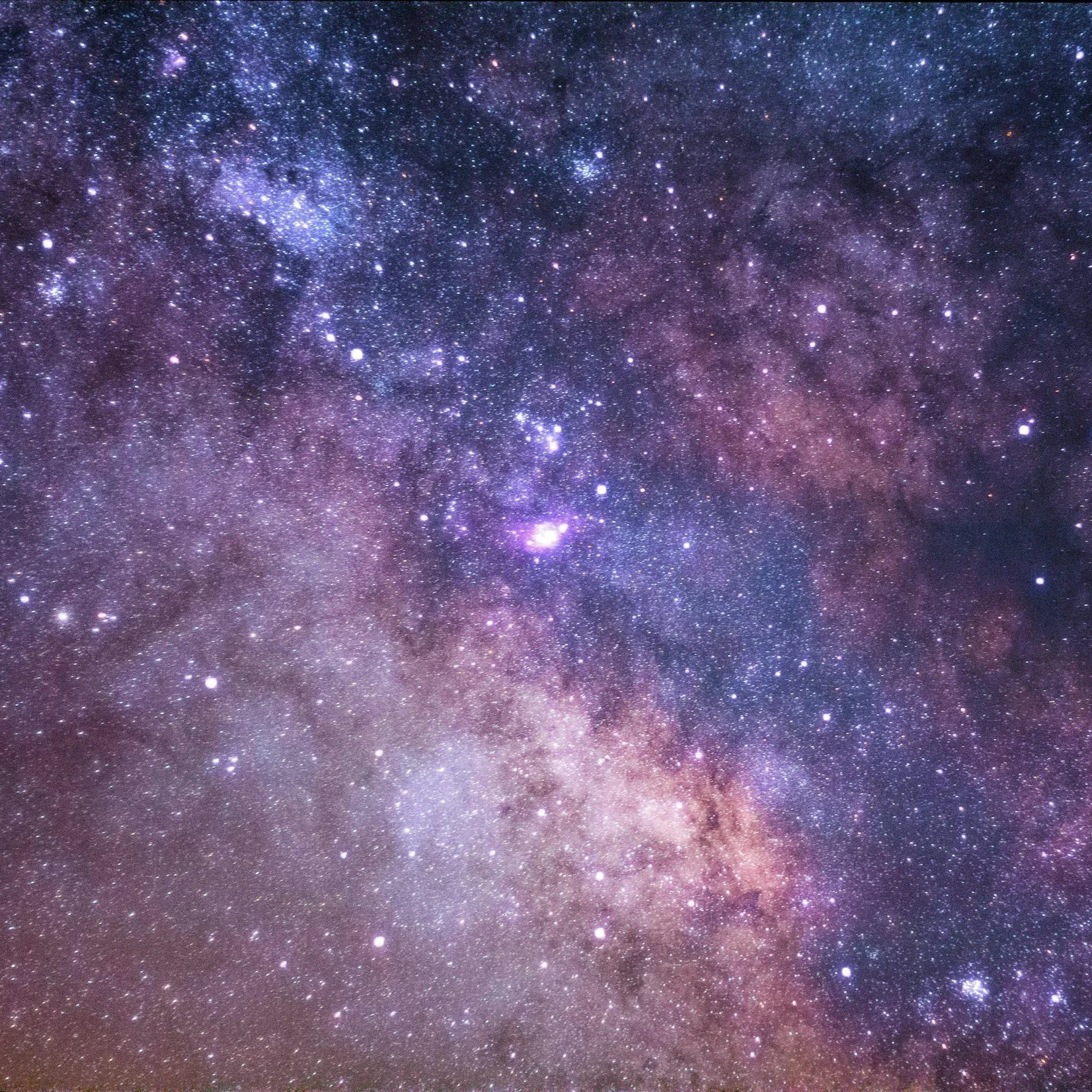A clear view of the Milky Way galaxy with countless stars and cosmic dust in space.