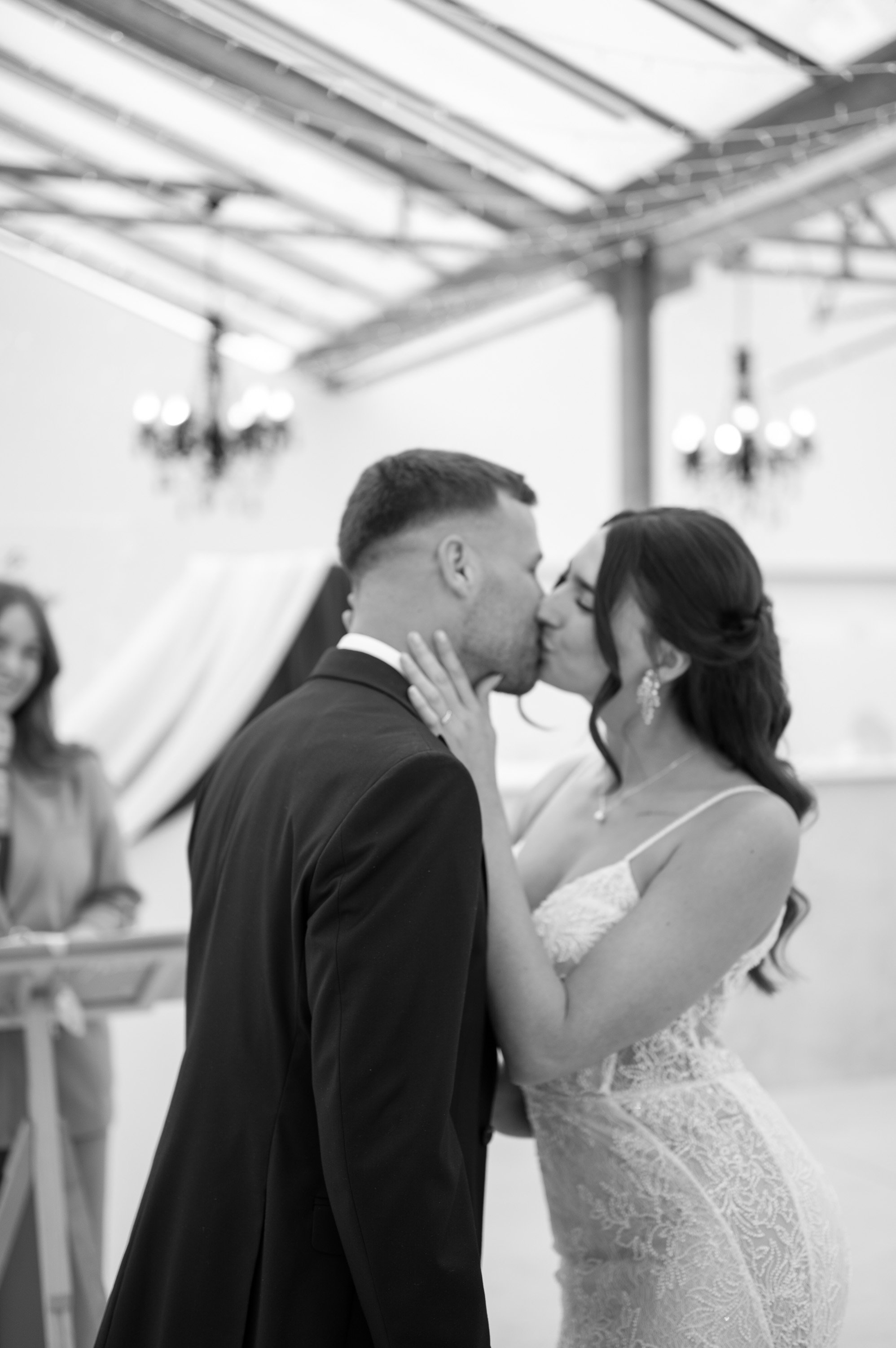 ceremony-kiss-bridal-couple-wedding-photography.jpg