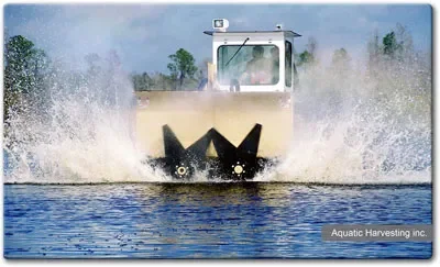 AVC Aquatic Vegetation Cutter extracting cattail roots at the rhizome zone
