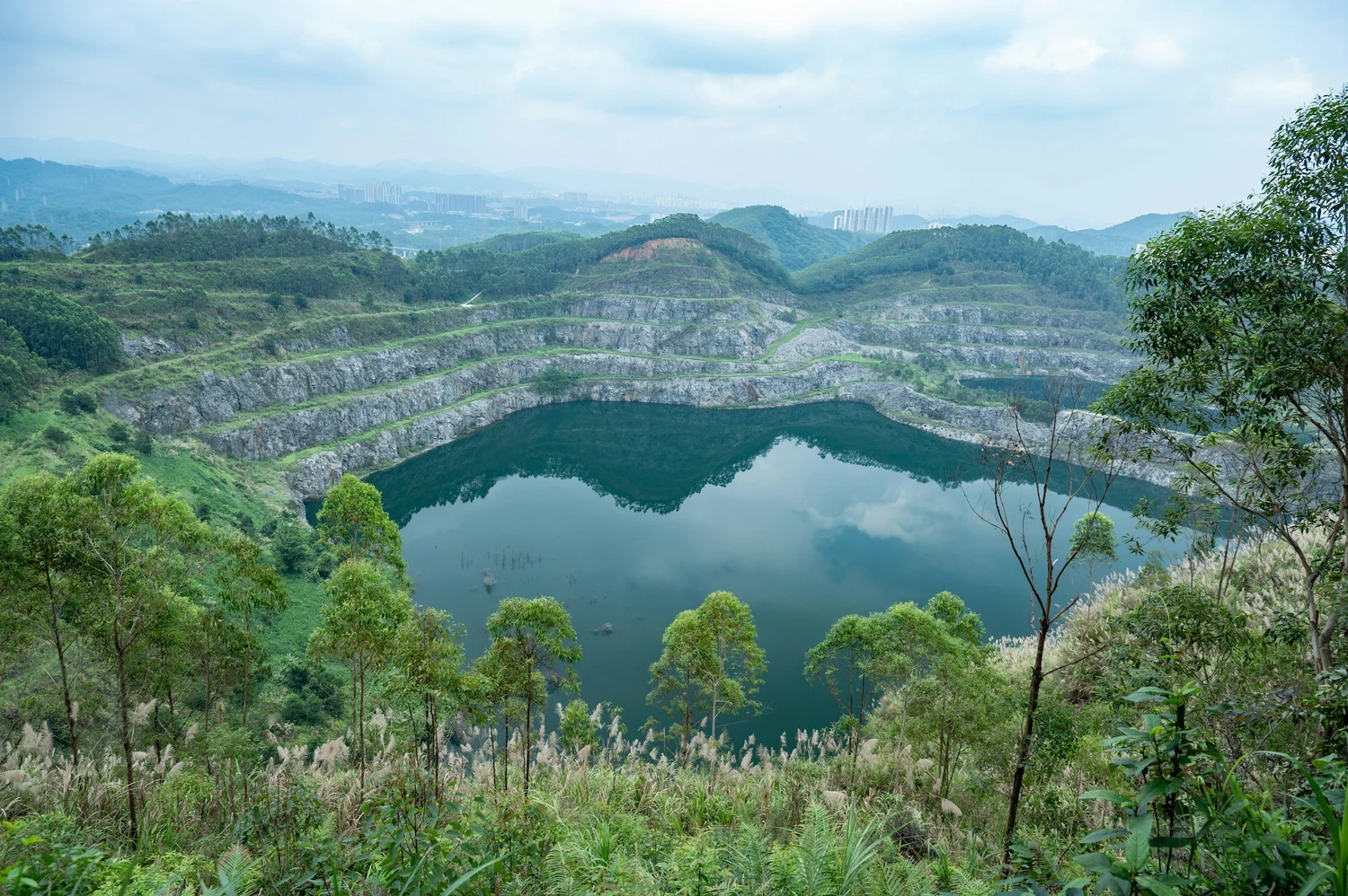 Mining site reservoir and crater lake requiring professional aquatic plant management and water quality services
