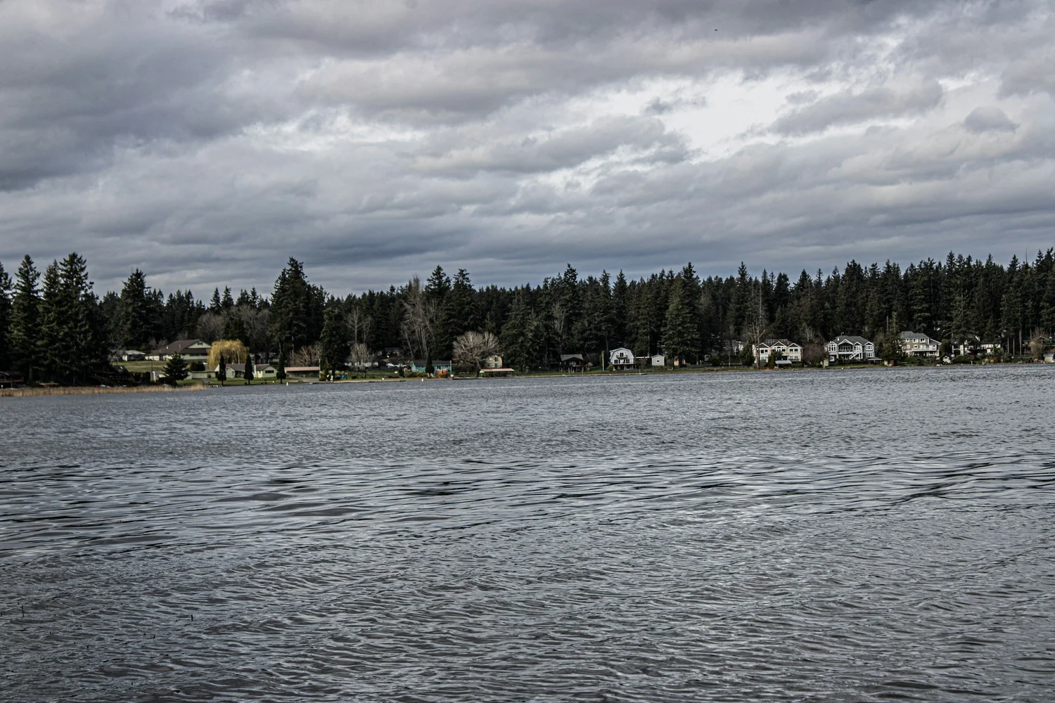HOA lakefront community waterway requiring algae control and aquatic vegetation removal services