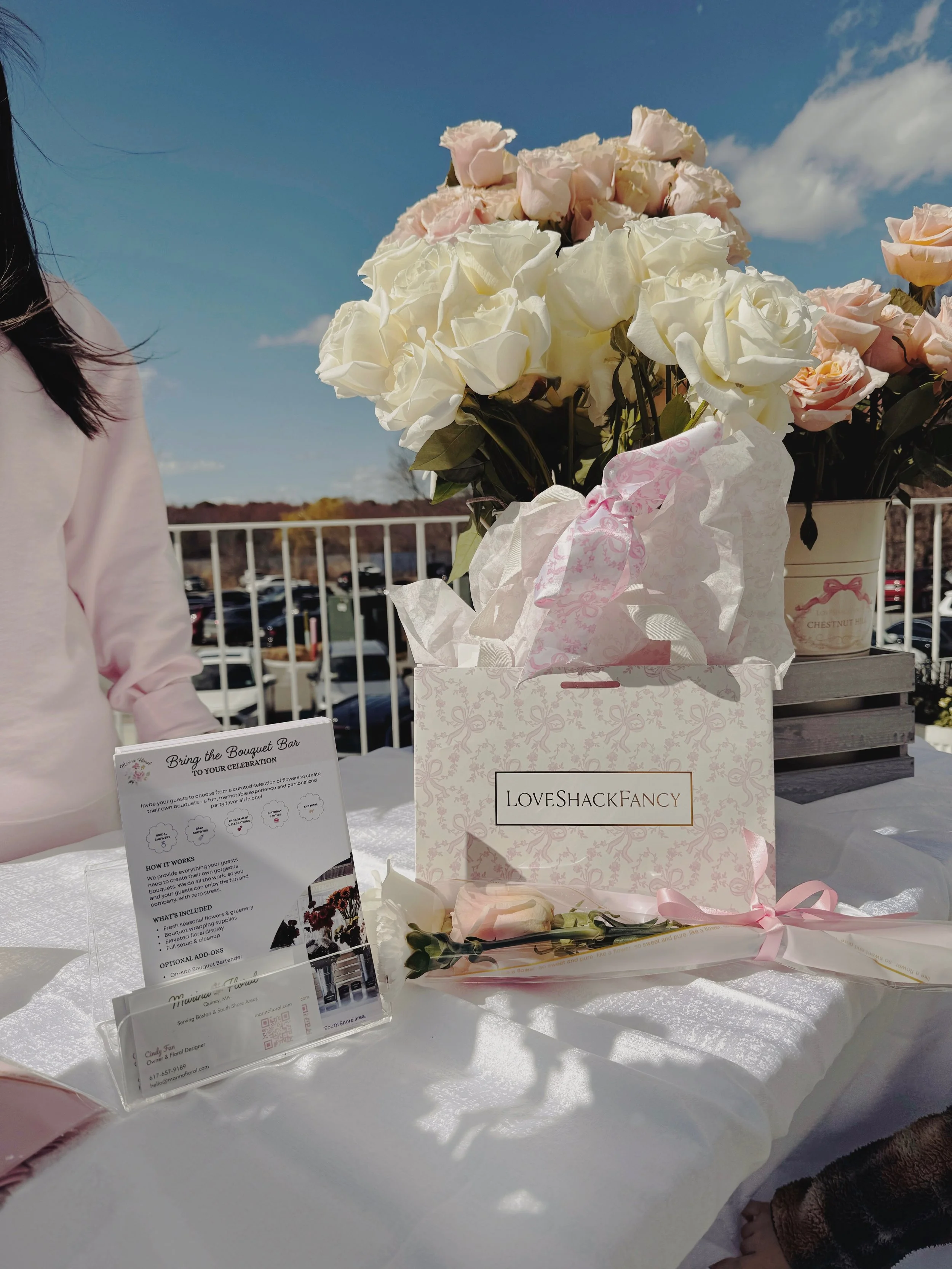 LoveShackFancy brand activation event with a custom bouquet bar experience where guests put together their own special flower bouquets to take home.