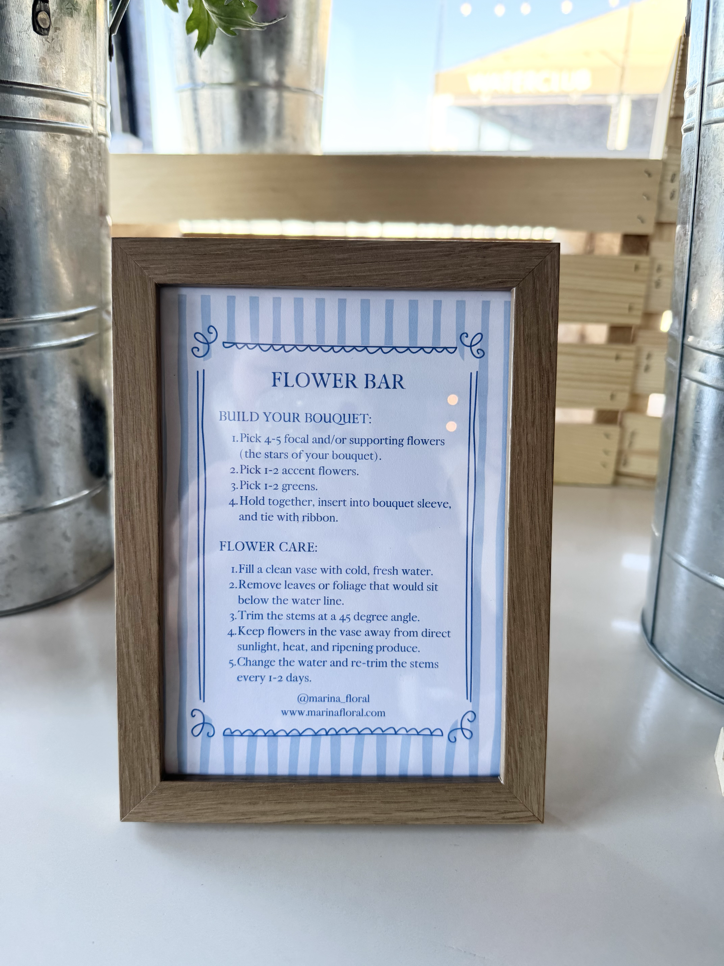 Sign with instructions for building and caring for a flower bouquet, titled 'Flower Bar'.