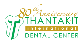 Logo celebrating the 80th anniversary of Thantakit International Dental Center with green and yellow text.