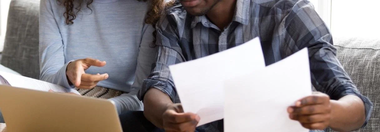 couple-with-papers.jpg