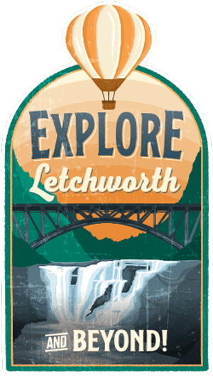 Sign promoting Letchworth with an illustration of a hot air balloon, a bridge, and waterfalls.