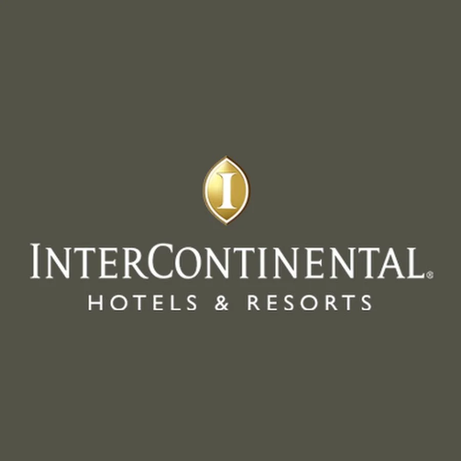 Logo of InterContinental Hotels & Resorts with a gold emblem and white text on a dark background.