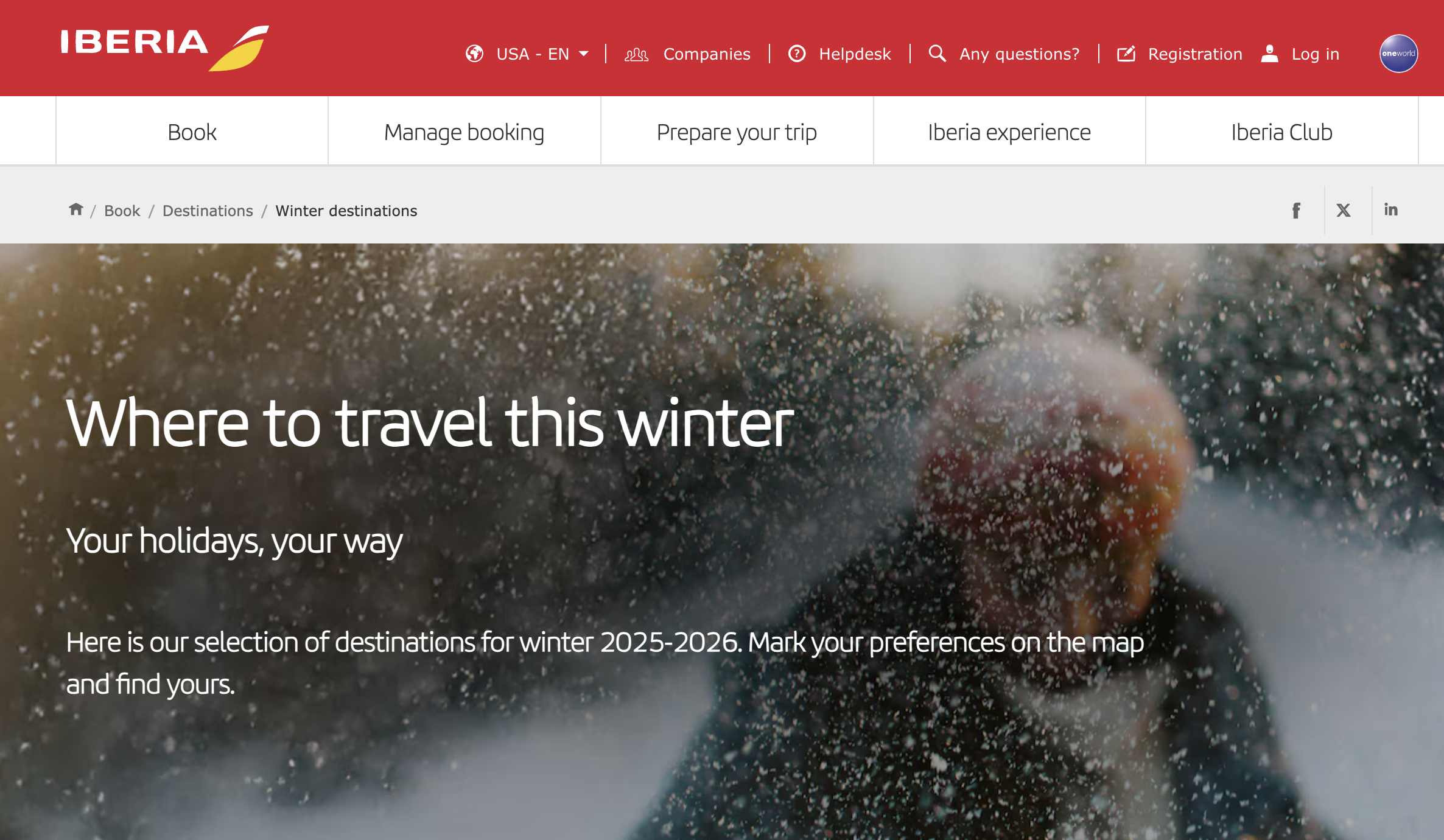 IBERIA travel website page showing winter destination options with a background image of a person in snow throwing snowflakes.
