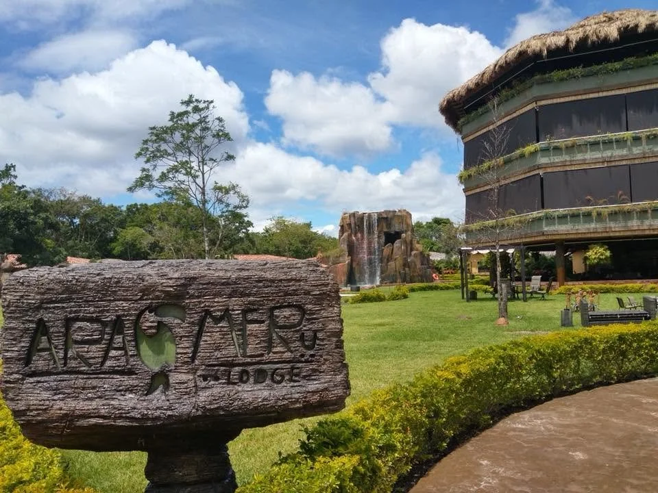A wooden sign that reads 'ARG