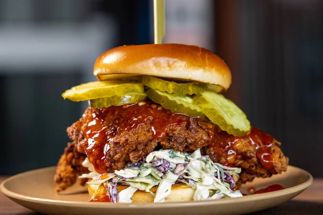 Brewsters-Gastropub-Menu-Items-Handhelds-Chicken-Sammy_web-uai-1032x688.jpg