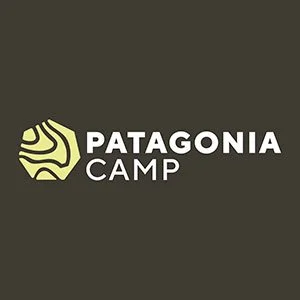 Patagonia Camp logo on a dark background with a yellow mountain icon