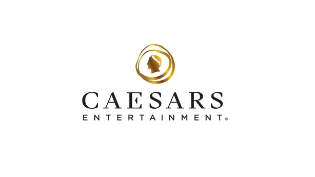 Caesars Entertainment logo with a gold circular emblem featuring a profile of a person's head, and the text 'CAESARS ENTERTAINMENT' underneath.