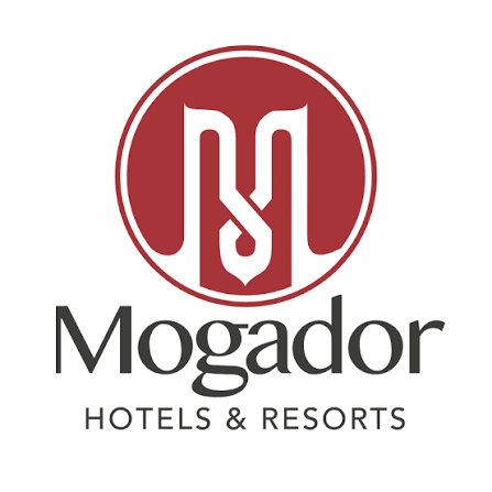 Logo of Mogador Hotels & Resorts with a red circular emblem and stylized white initials, and text below reading 'Mogador Hotels & Resorts'.