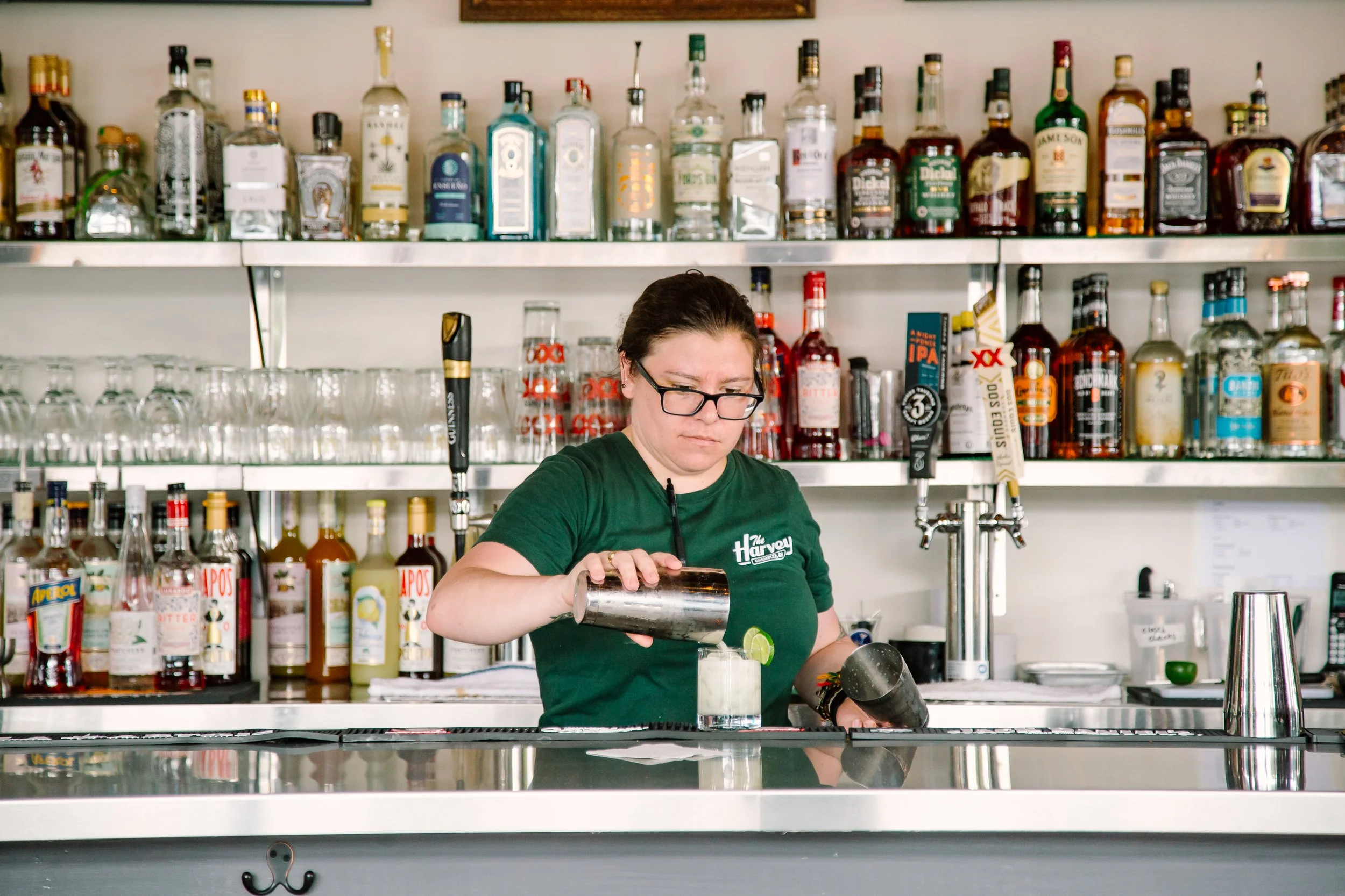 Bar top with drinks during a live game at The Harvey