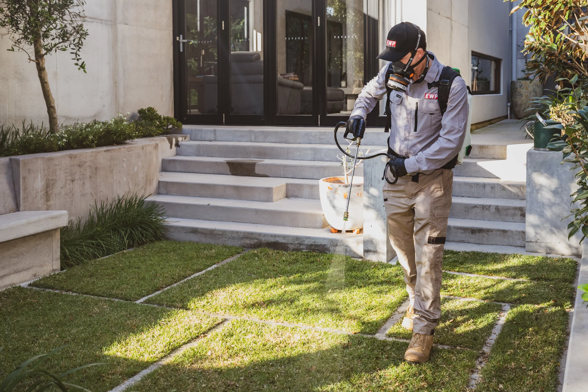 Ben spraying lawn.jpg