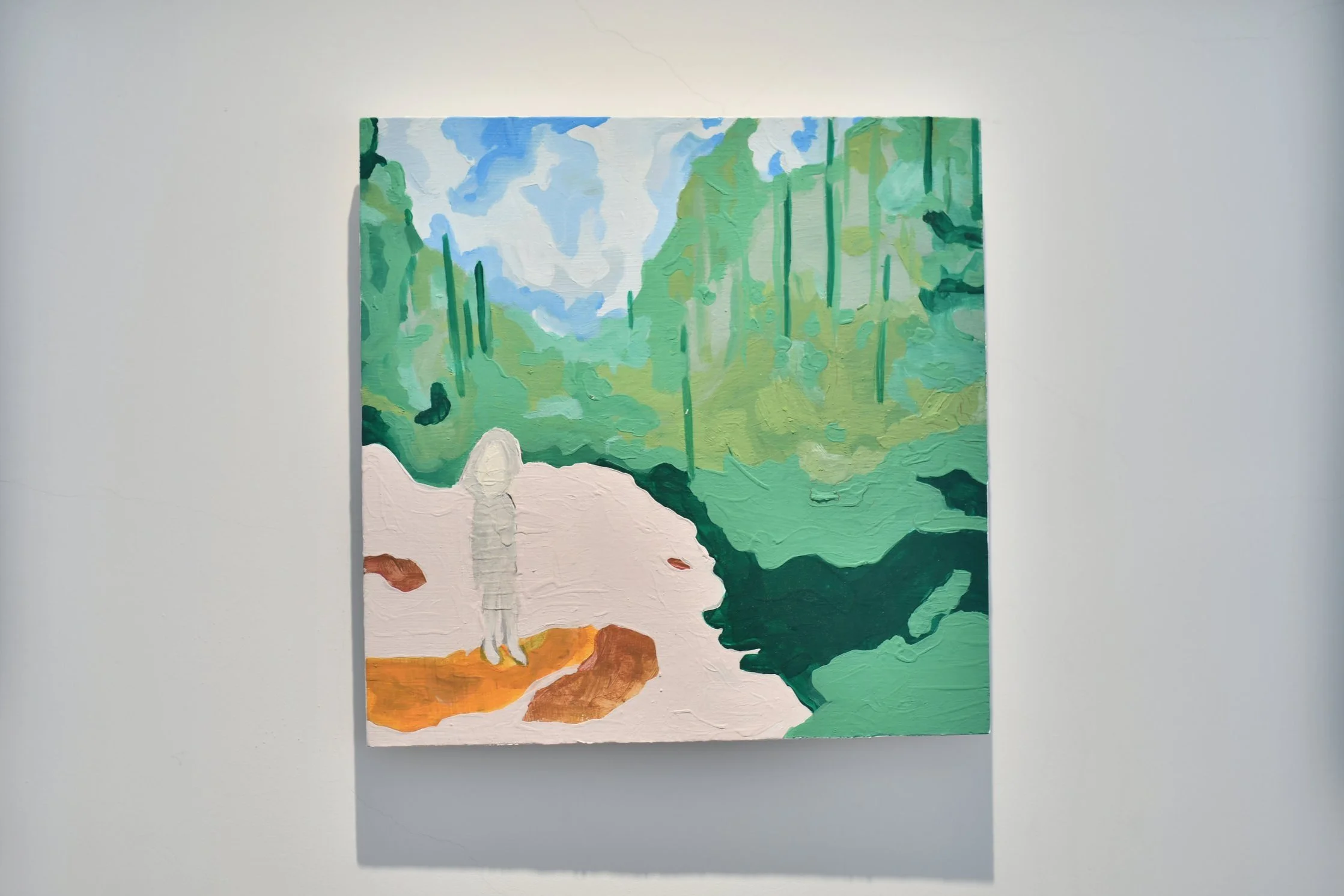 Painting by Pearl Reilly-Murray of an abstract painting of a forest scene with a person standing on a path, featuring green trees, blue sky, and earthy tones.