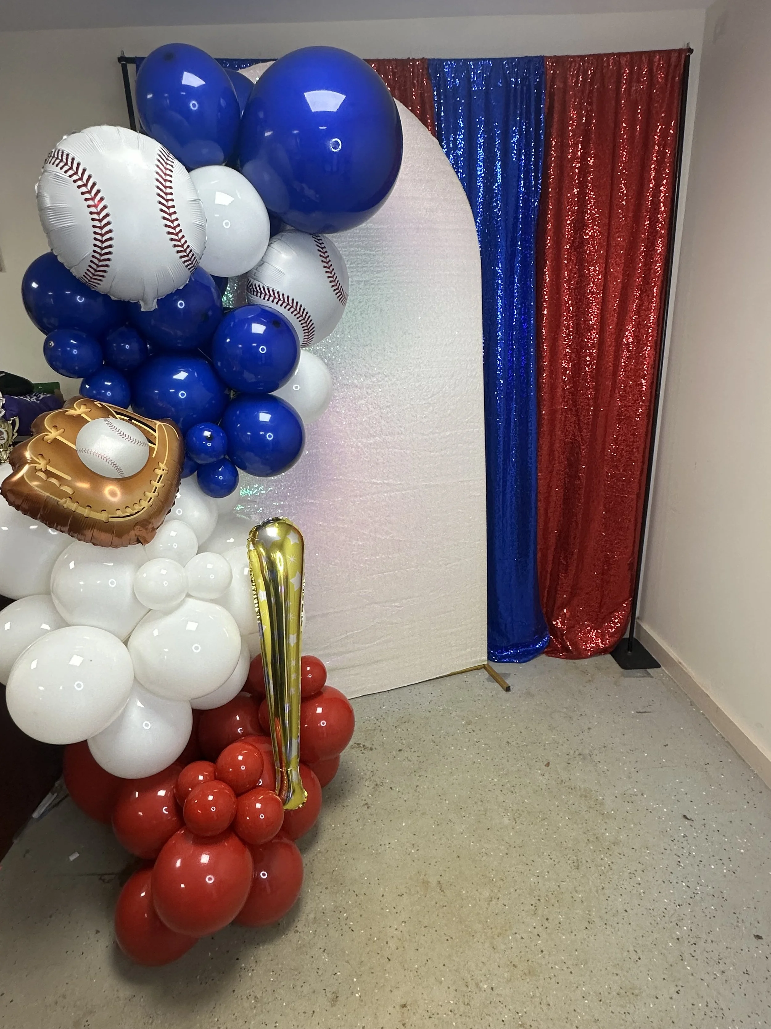 Honyes Booth LCN Little League Opening Day Photo Booth rental set up in Hampton Roads Virginia with Red, White, & blue baseball/softball balloon arch for Little Creek National Little League in Norfolk, Virginia. 